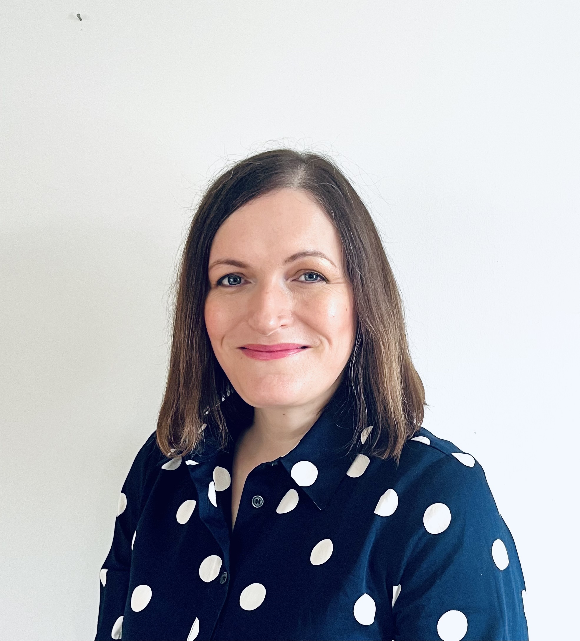 Dr. Claire May